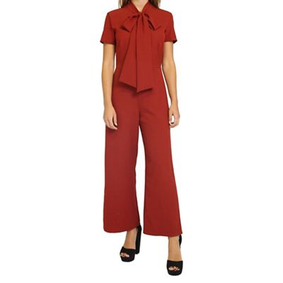 Red wide leg jumpsuit with neck tie